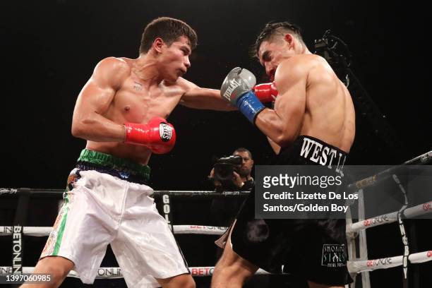 Jimmy Brenes lands a punch against Hector Perez at Fantasy Springs Resort Casino on May 12, 2022 in Indio, California.