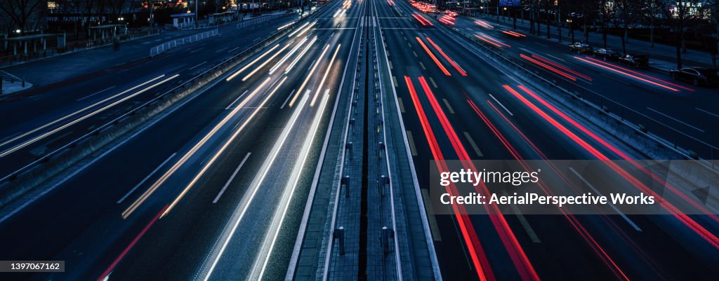 Busy Traffic, Traffic moving in both directions at dusk