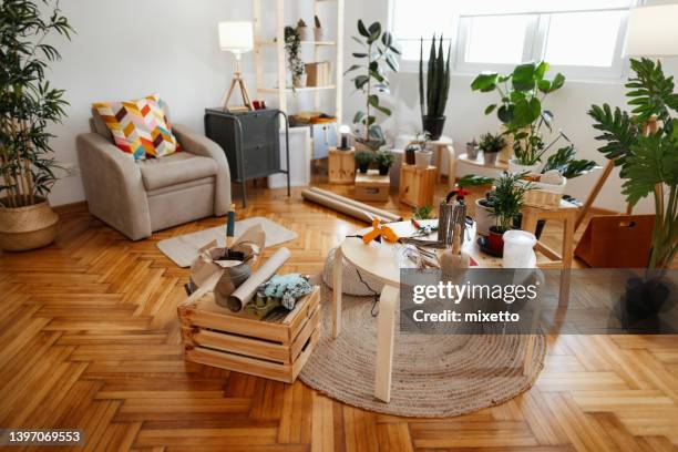 empty room with houseplants - messy living room stock pictures, royalty-free photos & images