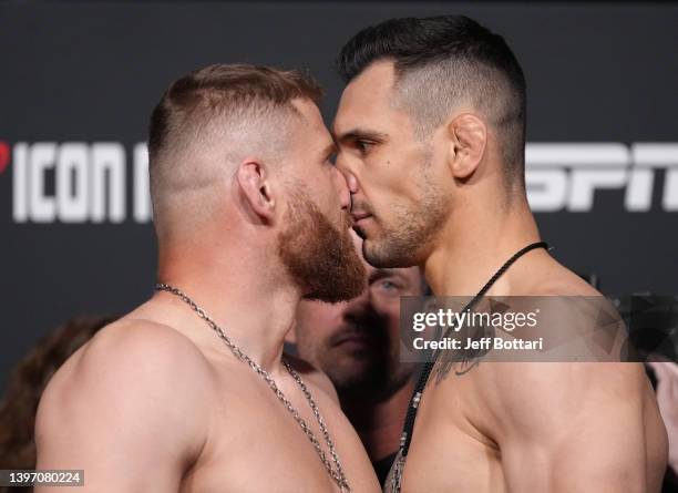 Opponents Jan Blachowicz of Poland and Aleksandar Rakic of Austria face off during the UFC Fight Night weigh-in at UFC APEX on May 13, 2022 in Las...