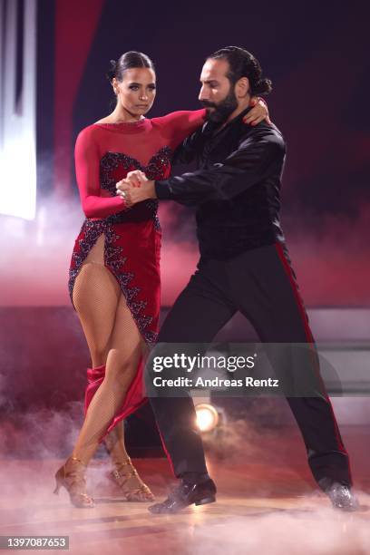 Amira Pocher and Massimo Sinató perform on stage during the 11th show of the 15th season of the television competition show "Let's Dance" at MMC...