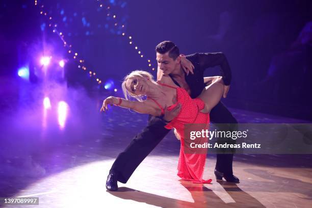 Janin Ullmann and Zsolt Sándor Cseke perform on stage during the 11th show of the 15th season of the television competition show "Let's Dance" at MMC...