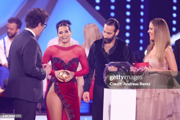 Daniel Hartwich, Amira Pocher, Massimo Sinató and Victoria Swarovski are seen on stage during the 11th show of the 15th season of the television...