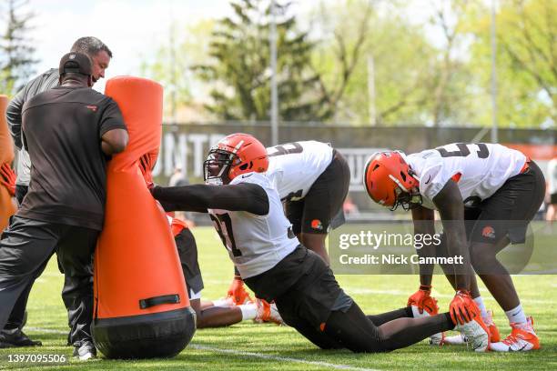 Perrion Winfrey of the Cleveland Browns runs a drill during the first day of Cleveland Browns rookie mini camp at CrossCountry Mortgage Campus on May...