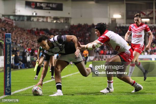 Darnell McIntosh of Hull FC goes over to score their side's second try during the Betfred Super League Round 12 match between St Helens and Hull FC...