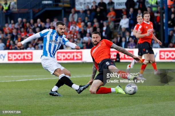Danel Sinani of Huddersfield Town scores to make it 1-0 during the Sky Bet Championship Play-off Semi Final 1st Leg match between Luton Town and...