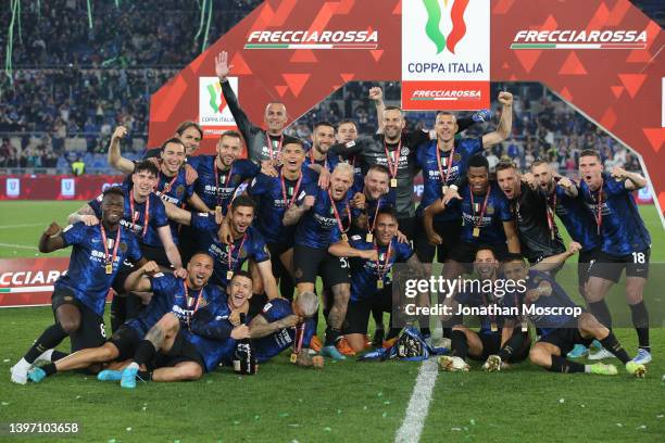 Internazionale celebrates with the trophy on the stage following the 4-2 victory in the Coppa Italia Final match between Juventus and FC...