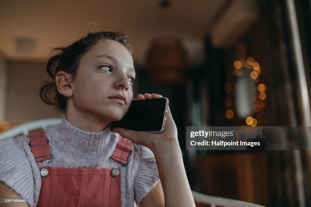 Crying Mobile Sad Teenage Girl Crying With Mobile Phone At Home High-Res Stock Photo ...