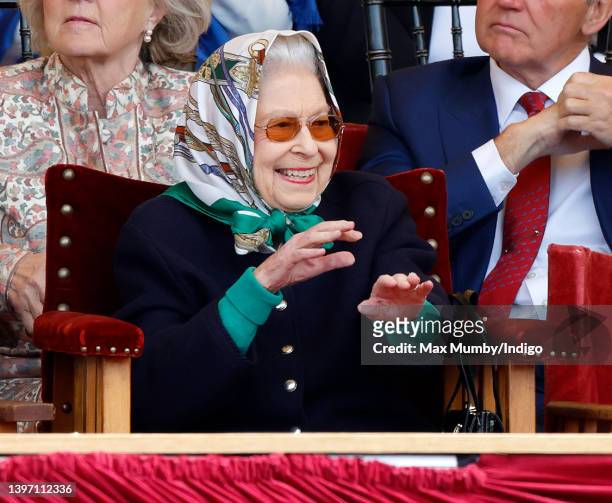 Queen Elizabeth II watches her horse 'Balmoral Leia' win the 'Horse & Hound Mountain & Moorland Supreme In Hand Championship' on day 2 of the Royal...