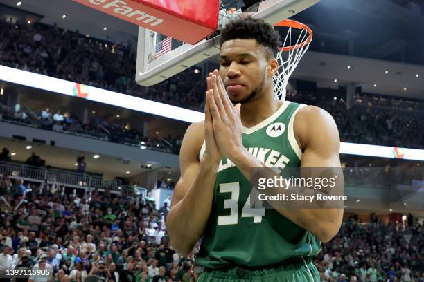 Giannis Antetokounmpo of the Milwaukee Bucks takes a moment prior to Game Six against the Boston Celtics in the 2022 NBA Playoffs Eastern Conference...