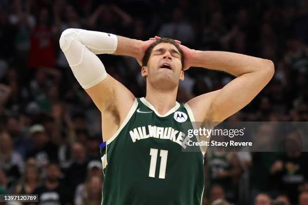 Brook Lopez of the Milwaukee Bucks reacts against the Boston Celtics during the second quarter in Game Six of the 2022 NBA Playoffs Eastern...