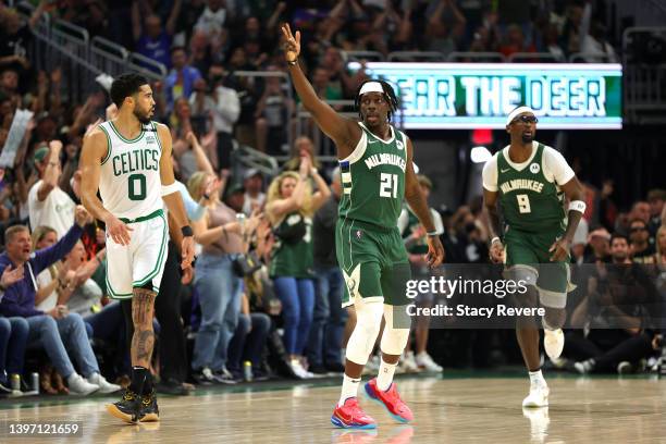 Jrue Holiday of the Milwaukee Bucks celebrates a three point basket against the Boston Celtics during the second quarter in Game Six of the 2022 NBA...