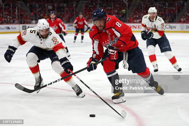 Alex Ovechkin of the Washington Capitals skates past Aaron Ekblad of the Florida Panthers during the second period in Game Six of the First Round of...