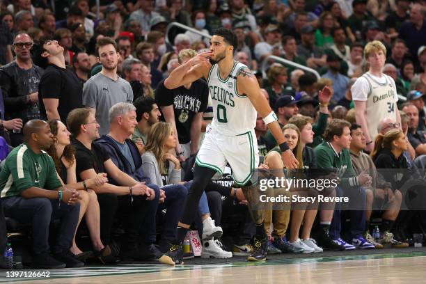 Jayson Tatum of the Boston Celtics celebrates a basket against the Milwaukee Bucks during the third quarter in Game Six of the 2022 NBA Playoffs...