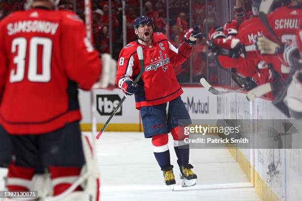 Alex Ovechkin of the Washington Capitals celebrates a goal by teammate T.J. Oshie against the Florida Panthers during the third period in Game Six of...