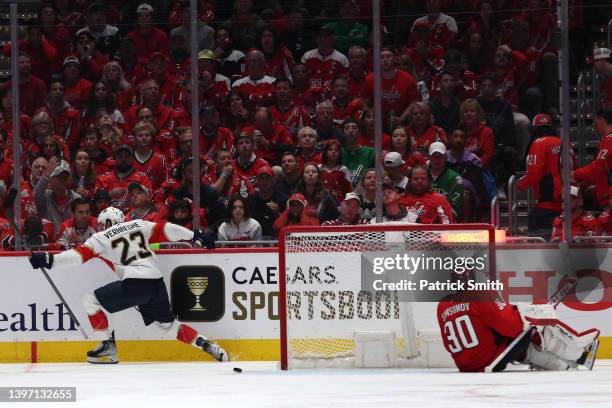Carter Verhaeghe of the Florida Panthers celebrates the game-winning goal in front of goalie Ilya Samsonov of the Washington Capitals during overtime...