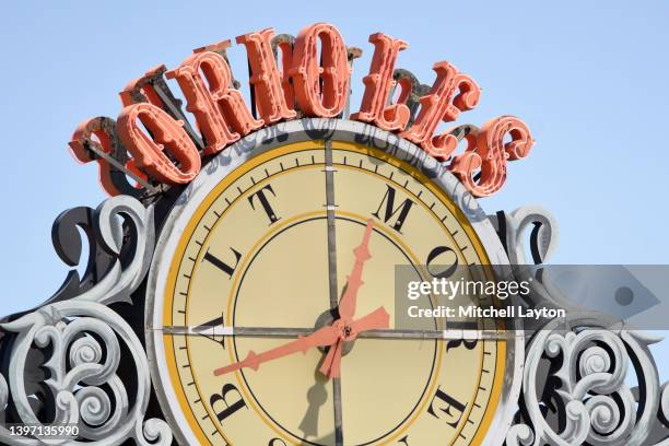 The Baltimore Orioles clock on the scoreboard during a baseball game between the Baltimore Orioles and the Kansas City Royals at Oriole Park at...