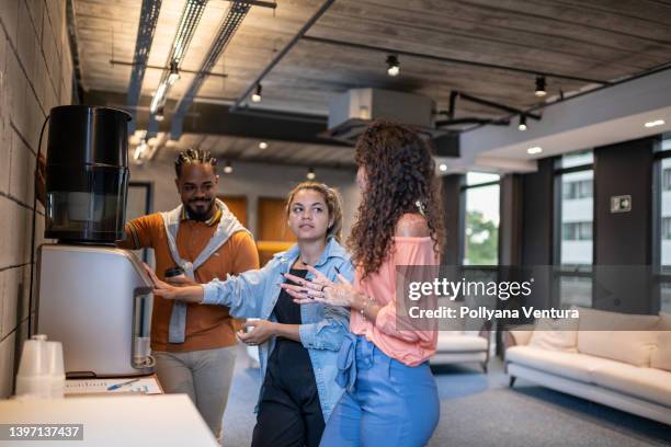 a coffee break - water cooler stockfoto's en -beelden