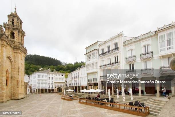 mondoñedo cathedral  town square, row of traditional building facades. galicia, spain. - mondonedo stock pictures, royalty-free photos & images