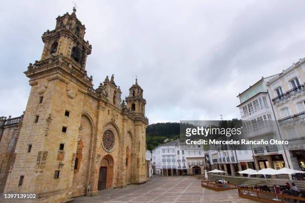mondoñedo cathedral  town square, row of traditional building facades. galicia, spain. - mondonedo stock pictures, royalty-free photos & images