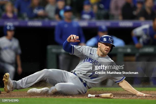 Hunter Dozier of the Kansas City Royals scores against the Colorado Rockies in the fifth inning at Coors Field on May 13, 2022 in Denver, Colorado.