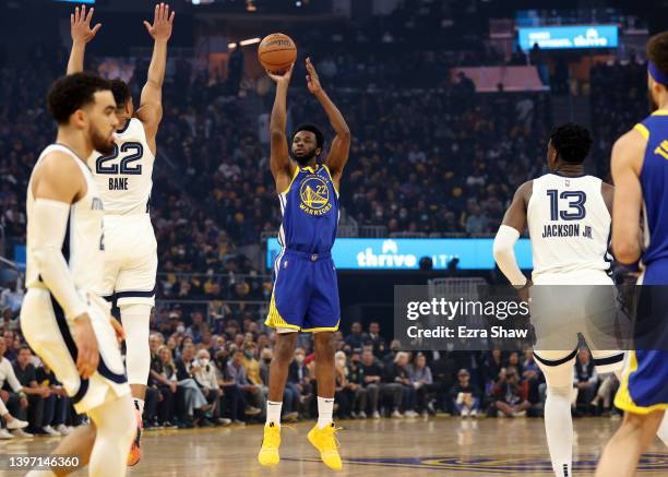 Andrew Wiggins of the Golden State Warriors takes a shot against the Memphis Grizzlies during the first quarter in Game Six of the 2022 NBA Playoffs...