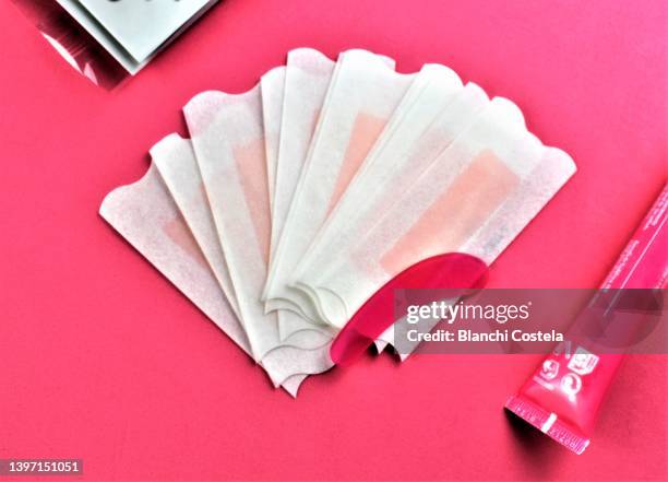 depilatory facial wax - wax strip stock pictures, royalty-free photos & images