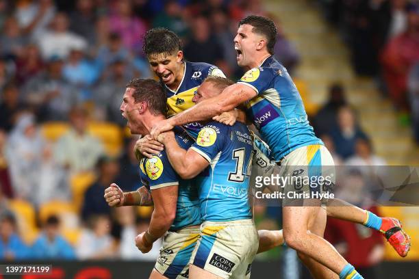 Jarrod Wallace of the Titans celebrates scoring a try during the round 10 NRL match between the Gold Coast Titans and the St George Illawarra Dragons...