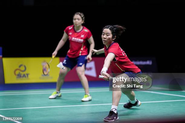 Chen Qingchen and Jia Yifan of China compete in the Uber Cup Final Women's Doubles match against Lee Sohee and Shin Seungchan of Korea during day...