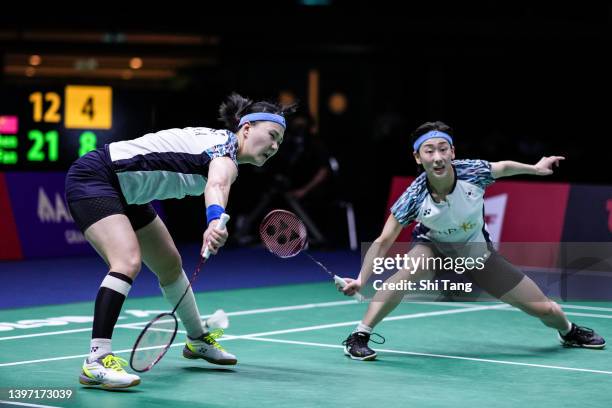 Lee Sohee and Shin Seungchan of Korea compete in the Uber Cup Final Women's Doubles match against Chen Qingchen and Jia Yifan of China during day...