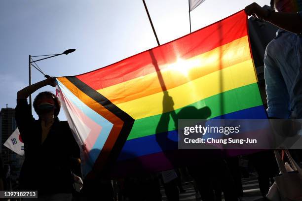 Supporters take part in a gathering ahead of the International Day Against Homophobia, Transphobia and Biphobia on May 14, 2022 in Seoul, South...