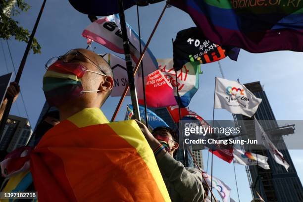 Supporters take part in a gathering ahead of the International Day Against Homophobia, Transphobia and Biphobia on May 14, 2022 in Seoul, South...