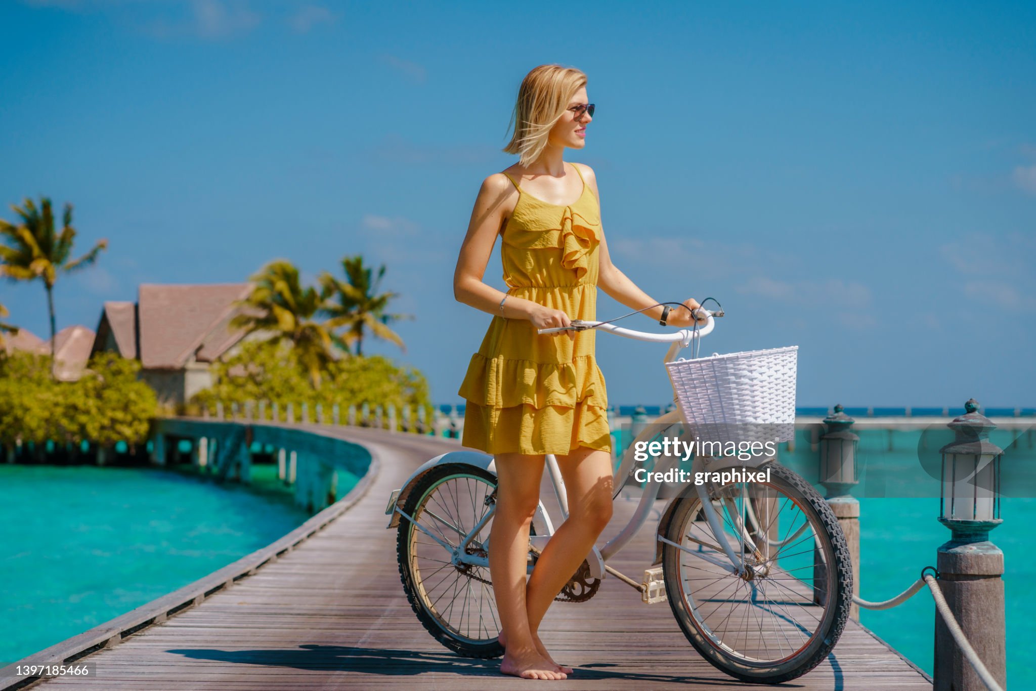 https://media.gettyimages.com/id/1397185466/photo/beautiful-woman-posing-with-bicycle-on-wooden-jetty.jpg?s=2048x2048&w=gi&k=20&c=DkNmOOyGK-zcBb_PxzdRoqeYA5QIVOD-uQNvgA9BO7o=