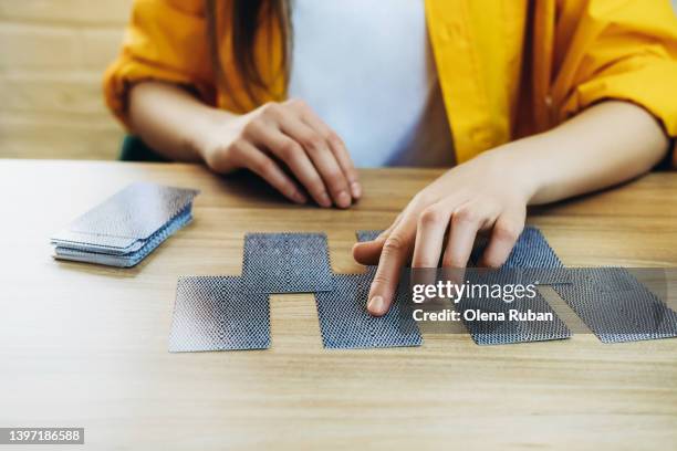 fortune teller read tarot cards. - palmistry hand stock-fotos und bilder