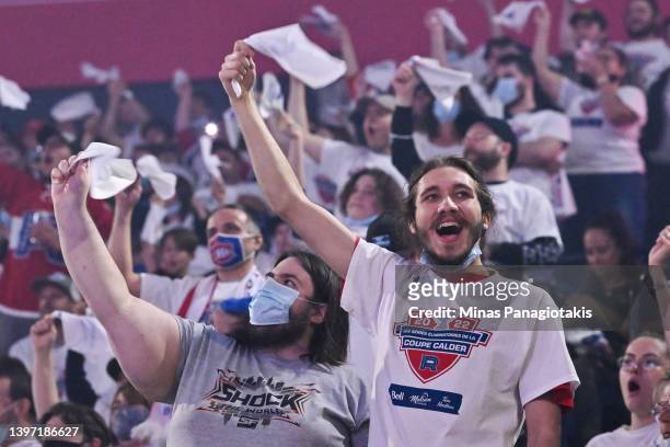 Spectators cheer on prior to Game Three of the North Division Semifinals between the Laval Rocket and the Syracuse Crunch at Place Bell on May 12,...