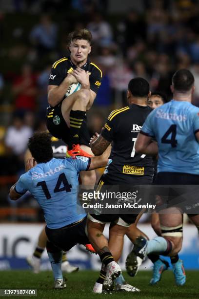 Jordie Barrett of the Hurricanes catches the ball during the round 13 Super Rugby Pacific match between the NSW Waratahs and the Hurricanes at...
