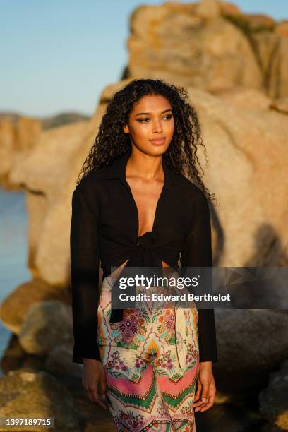 Model Lauryn Nye poses backstage after the Etam Cruise 2022 show at Domaine de Murtoli on May 12, 2022 in Corsica, France.