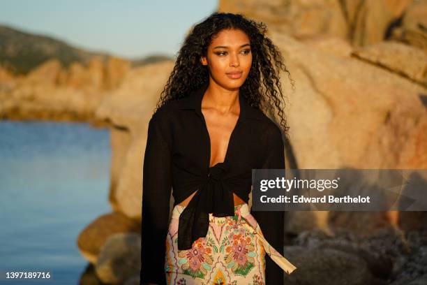 Model Lauryn Nye poses backstage after the Etam Cruise 2022 show at Domaine de Murtoli on May 12, 2022 in Corsica, France.