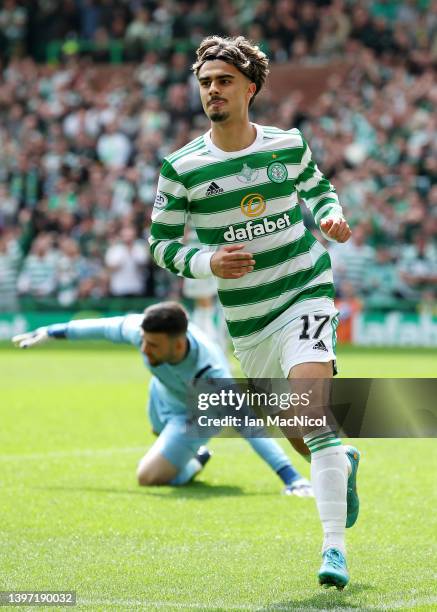 Jota of Celtic celebrates after scoring their side's fourth goal during the Cinch Scottish Premiership match between Celtic and Motherwell at Celtic...