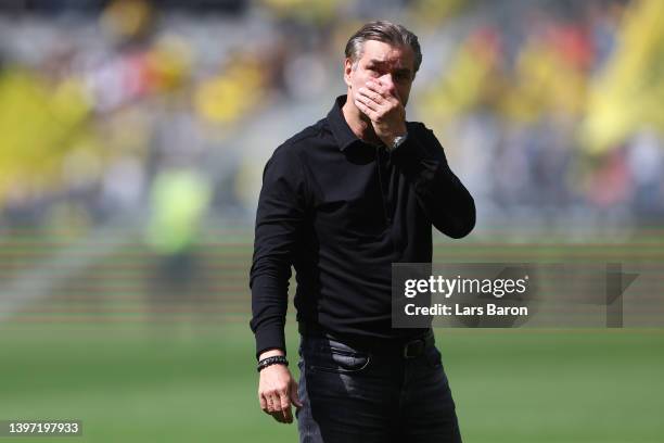 Dortmund Technical Director, Michael Zorc acknowledges the fans prior to the Bundesliga match between Borussia Dortmund and Hertha BSC at Signal...