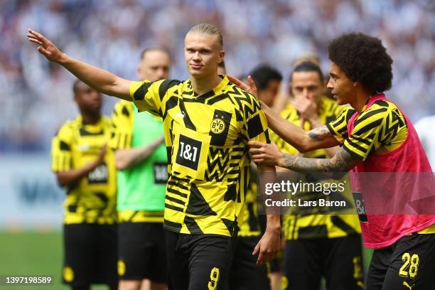 Erling Haaland of Borussia Dortmund acknowledges the fans next to teammate Axel Witsel prior to the Bundesliga match between Borussia Dortmund and...