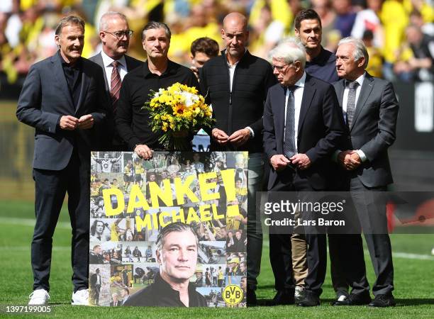 Dortmund Technical Director, Michael Zorc is presented with a thank you gift prior to the Bundesliga match between Borussia Dortmund and Hertha BSC...
