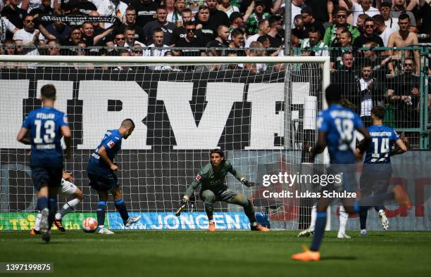 Andrej Kramaric of TSG Hoffenheim scores their side's first goal during the Bundesliga match between Borussia Mönchengladbach and TSG Hoffenheim at...