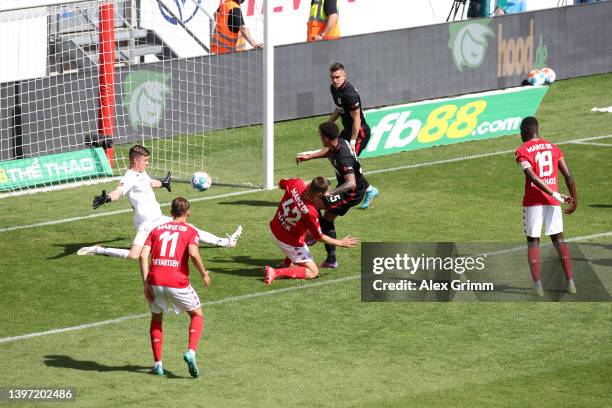 Tuta of Eintracht Frankfurt scores their sides first goal during the Bundesliga match between 1. FSV Mainz 05 and Eintracht Frankfurt at MEWA Arena...