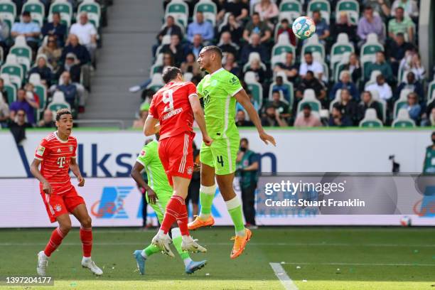 Robert Lewandowski of FC Bayern Muenchen scores their team's second goal during the Bundesliga match between VfL Wolfsburg and FC Bayern München at...