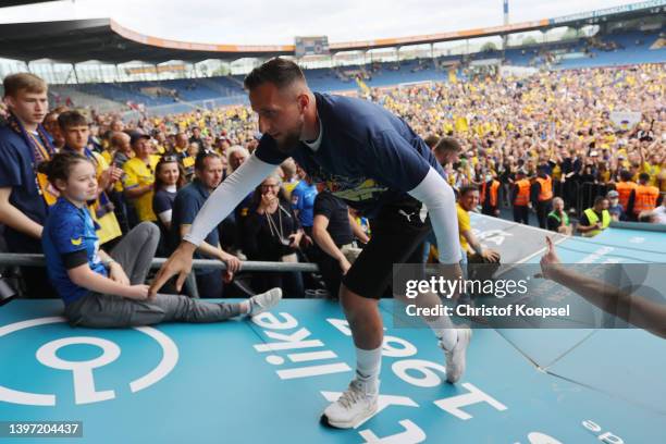 Robin Krausse of Braunschweig celebrates the rise to the Second Bundesliga after the 3. Liga match between Eintracht Braunschweig and Viktoria Köln...