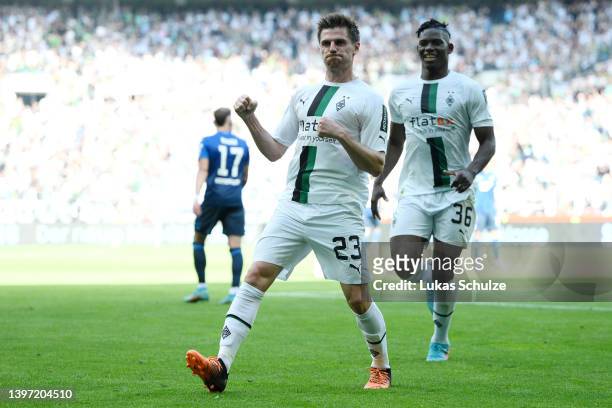 Jonas Hofmann of Borussia Monchengladbach celebrates after scoring their side's third goal during the Bundesliga match between Borussia...