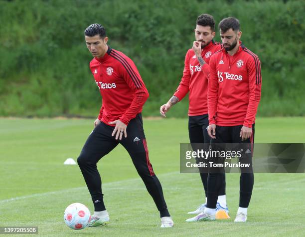 Cristiano Ronaldo, Alex Telles, Bruno Fernandes of Manchester United in action during a first team training session at Carrington Training Ground on...
