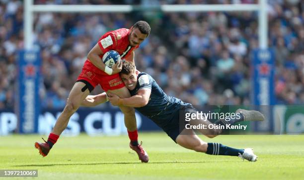 Matthis Lebel of Stade Toulousain is tackled by Garry Ringrose of Leinster during the Heineken Champions Cup Semi Final match between Leinster Rugby...