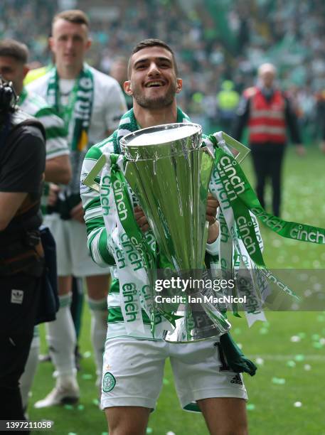 Liel Abada of Celtic i seen with the Cinch Scottish Premiership Trophy during the Cinch Scottish Premiership match between Celtic and Motherwell at...